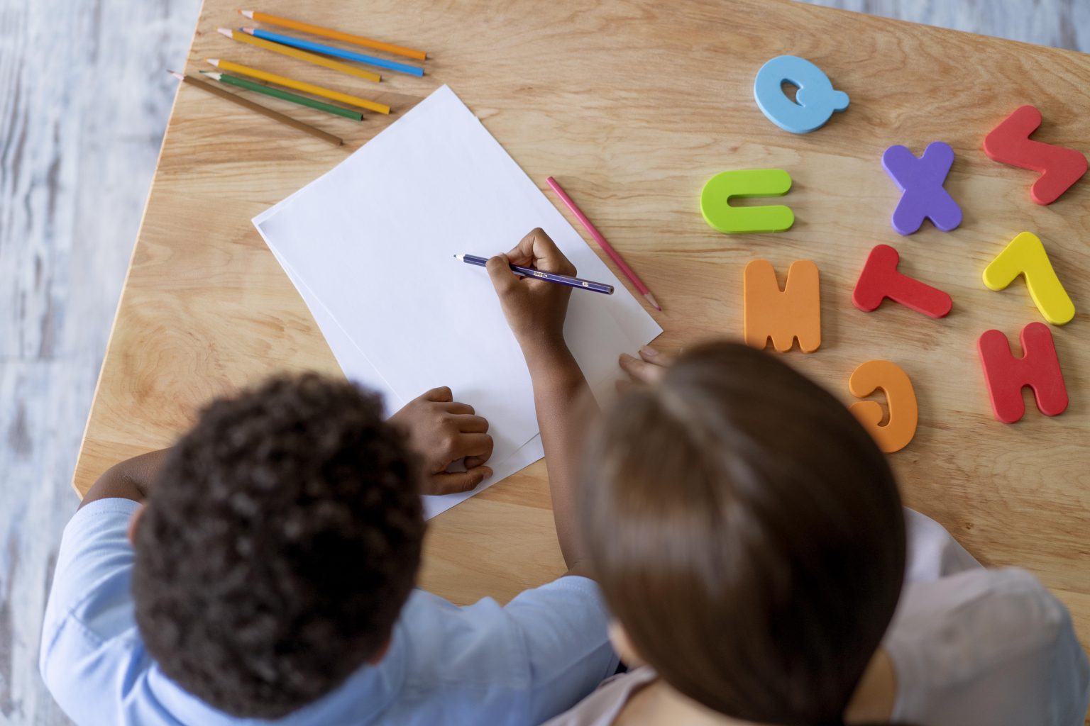 boy-having-occupational-therapy-session-with-psychologist